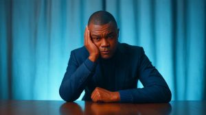 Illustration de Marcel Desailly confronté à des défis financiers et personnels. Image réalisée par IA.